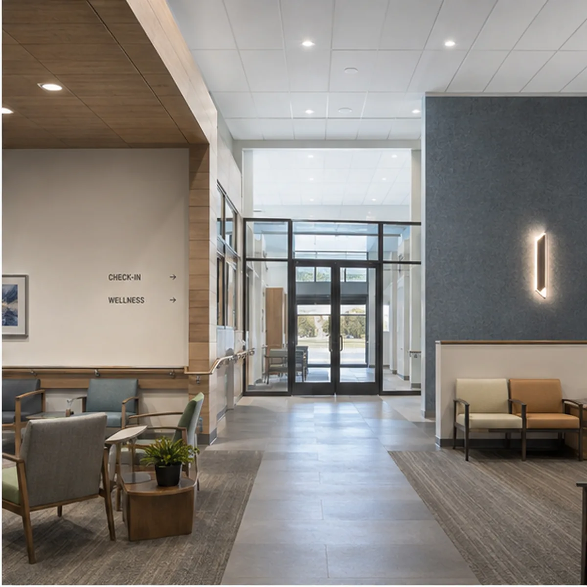 Riverbend interior waiting and circulation area at the new-to-existing transition.